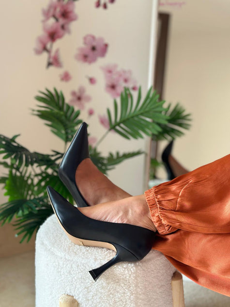 Décolleté nero tacco scultoreo